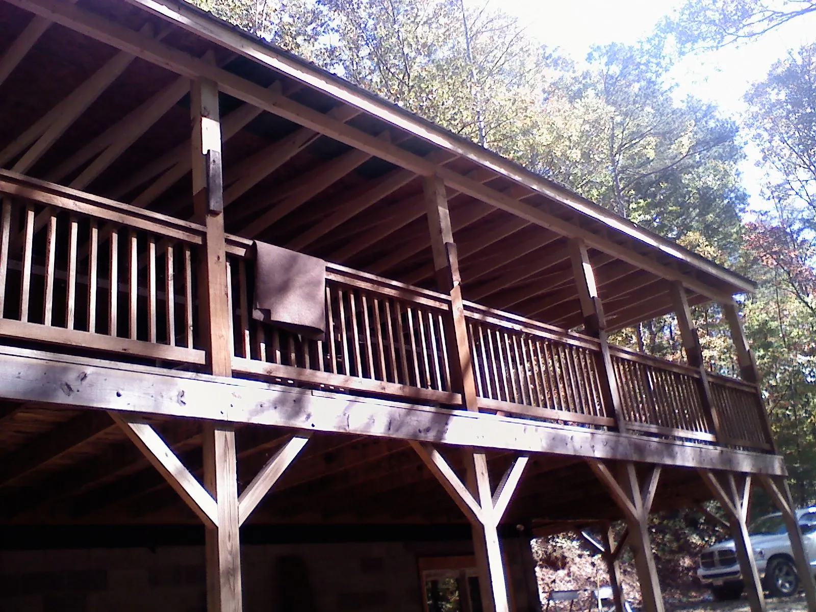 Timber framing under a new elevated porch and deck — Roof Leak Repair in Riverdale by Roofing Brothers